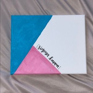 Blue pink and white sigma kappa painting